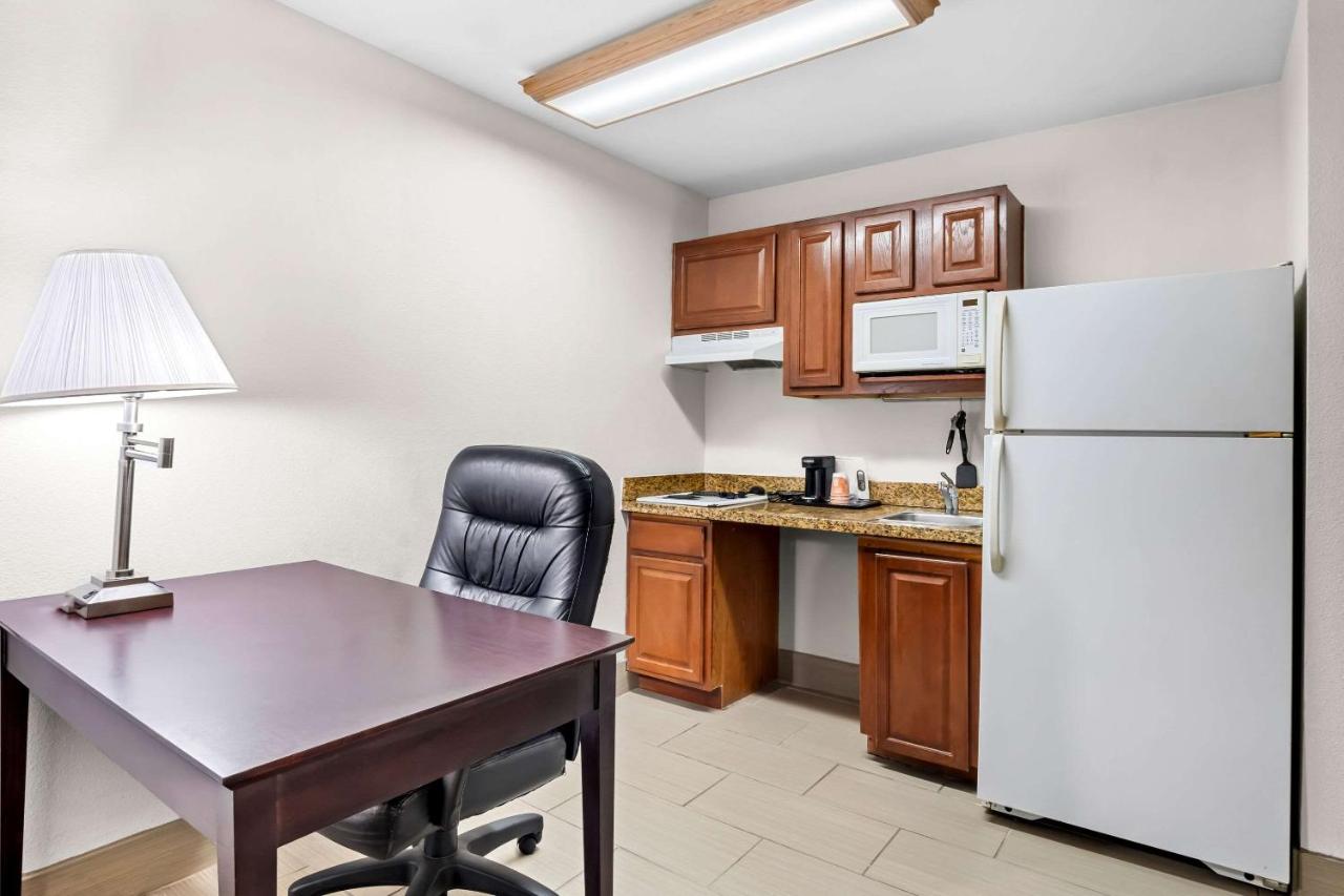 Kitchen and Work Desk at MainStay Suites Addison-Dallas
